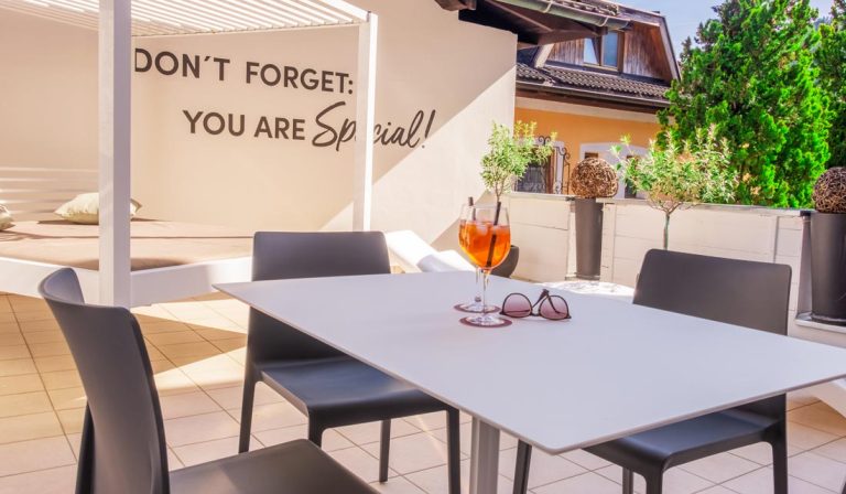 a table and chairs on a patio